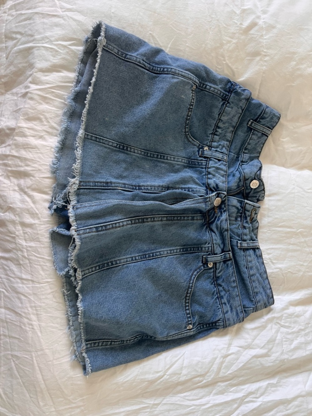 High-Rise Raw-Hem Denim Shorts in Light Blue